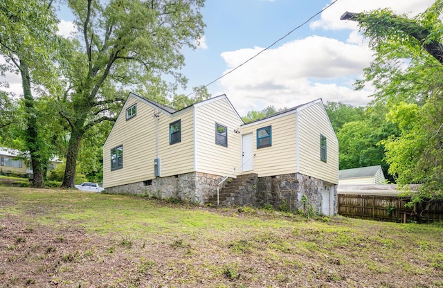 35 Agnes Ave, Chattanooga, TN 37406 - view of side of property featuring stairs, a garage, and stone siding