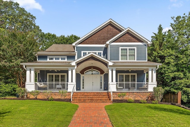 715 Forest Ave, Chattanooga, TN 37405 - craftsman-style house with a porch, ceiling fan, and a front lawn
