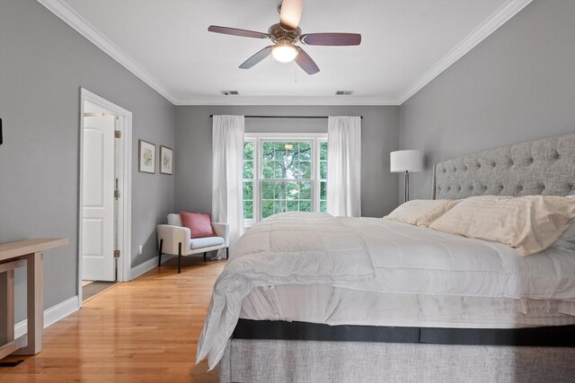 715 Forest Ave, Chattanooga, TN 37405 - bedroom with light wood finished floors, ornamental molding, and ceiling fan