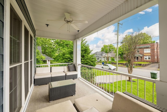 715 Forest Ave, Chattanooga, TN 37405 - covered porch featuring a ceiling fan, outdoor lounge area, a residential view, and a yard