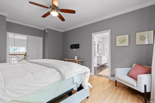 715 Forest Ave, Chattanooga, TN 37405 - bedroom with light wood finished floors, ornamental molding, ensuite bath, and a ceiling fan