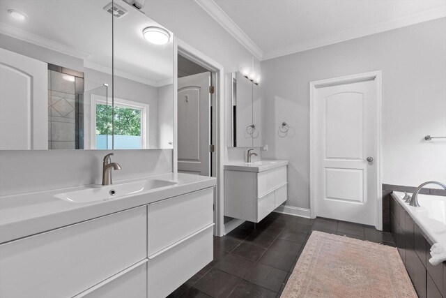 715 Forest Ave, Chattanooga, TN 37405 - bathroom featuring two vanities, crown molding, a garden tub, and tile patterned flooring