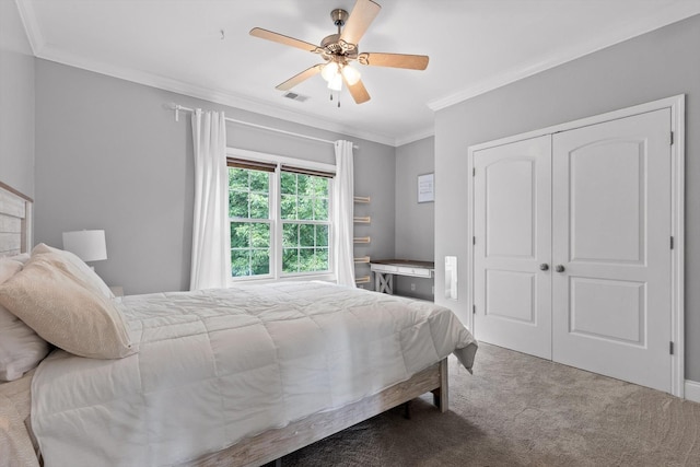 715 Forest Ave, Chattanooga, TN 37405 - bedroom with carpet, crown molding, a closet, and ceiling fan