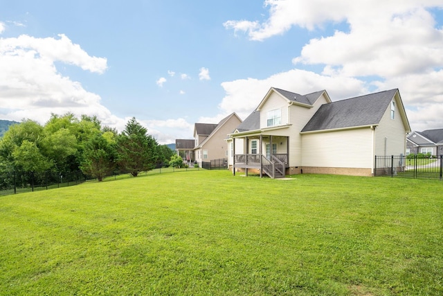 8539 Lexie Ln, Ooltewah, TN 37363 - back of property featuring a fenced backyard and a shingled roof