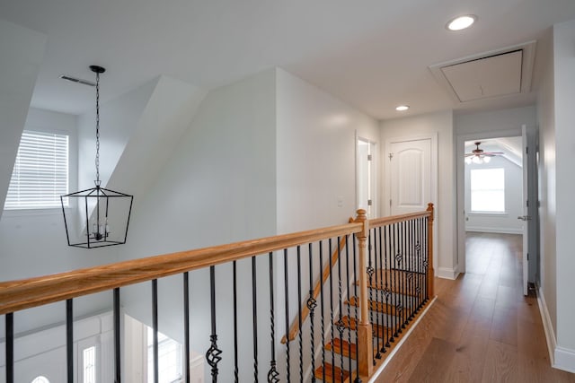 8539 Lexie Ln, Ooltewah, TN 37363 - corridor featuring attic access, an upstairs landing, light wood-style floors, and recessed lighting