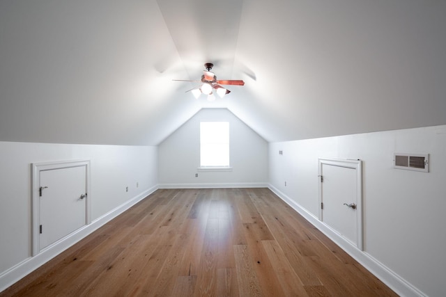 8539 Lexie Ln, Ooltewah, TN 37363 - additional living space featuring a ceiling fan, lofted ceiling, and light wood finished floors