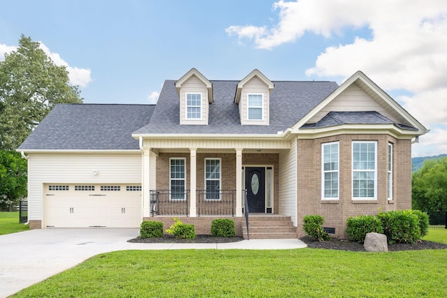 8539 Lexie Ln, Ooltewah, TN 37363 - view of front of property featuring a porch, a front yard, roof with shingles, an attached garage, and driveway