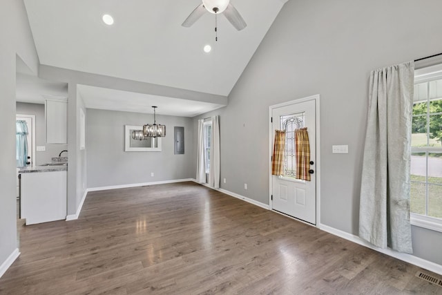 521 5th Ave N, Lewisburg, TN 37091 - unfurnished living room with a ceiling fan, a chandelier, high vaulted ceiling, dark wood finished floors, and recessed lighting