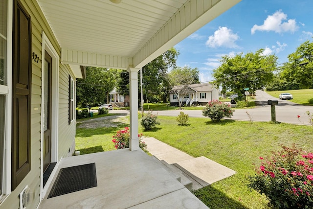 521 5th Ave N, Lewisburg, TN 37091 - covered porch featuring a lawn
