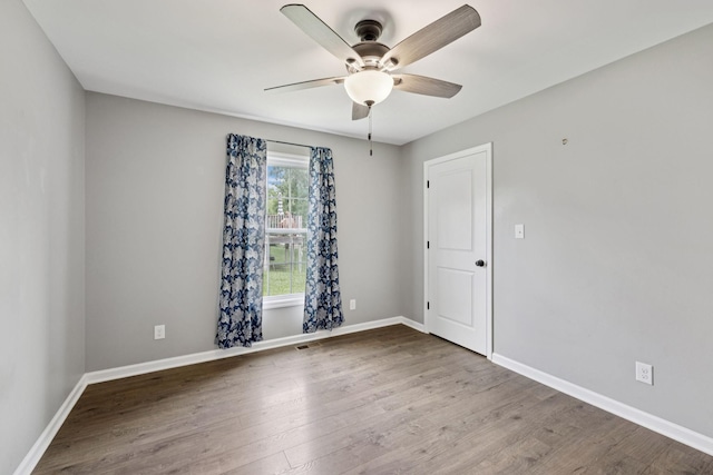 521 5th Ave N, Lewisburg, TN 37091 - empty room with ceiling fan and wood finished floors