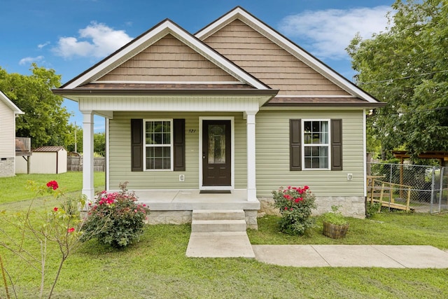 521 5th Ave N, Lewisburg, TN 37091 - bungalow-style home featuring a porch and a shed