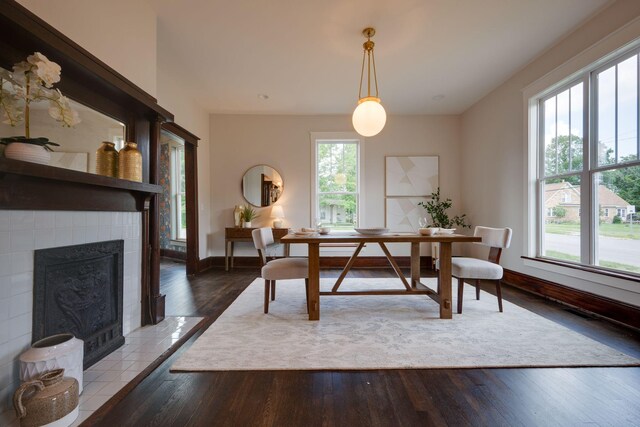 414 W College St, Dickson, TN 37055 - dining space featuring hardwood / wood-style flooring and a fireplace
