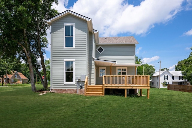 414 W College St, Dickson, TN 37055 - rear view of house featuring a lawn, a wooden deck, and roof with shingles