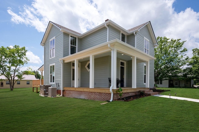 414 W College St, Dickson, TN 37055 - view of front facade featuring a porch, a front lawn, and a chimney