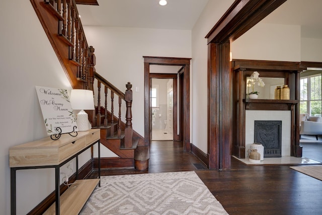 414 W College St, Dickson, TN 37055 - foyer entrance with stairs, wood finished floors, a fireplace with flush hearth, and recessed lighting