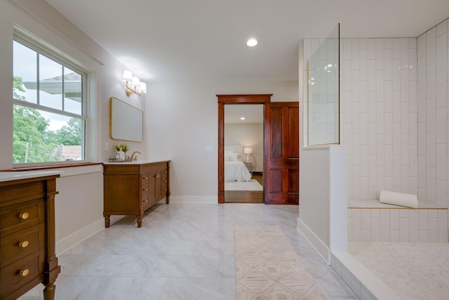 414 W College St, Dickson, TN 37055 - bathroom featuring vanity, walk in shower, recessed lighting, and ensuite bathroom
