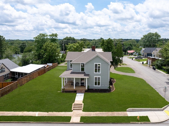 414 W College St, Dickson, TN 37055 - view of front of home featuring covered porch, a shingled roof, and a chimney