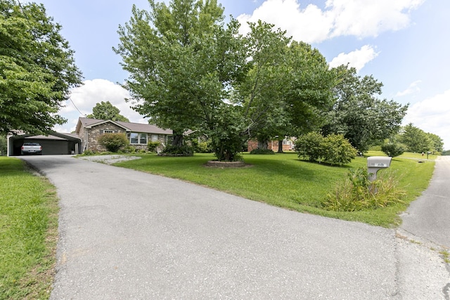 2802 Canterbury Dr, Springfield, TN 37172 - view of front of house featuring a front lawn and a detached carport