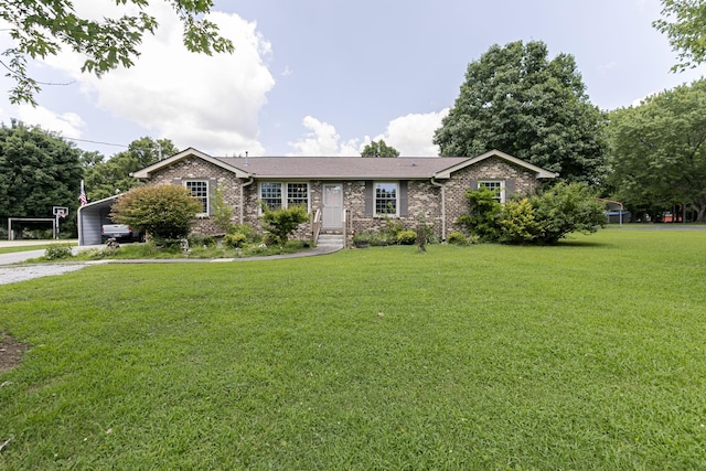 2802 Canterbury Dr, Springfield, TN 37172 - ranch-style house featuring a front lawn, gravel driveway, a detached carport, and brick siding