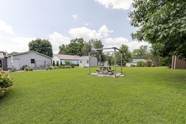 2802 Canterbury Dr, Springfield, TN 37172 - view of green lawn featuring a storage shed and a patio