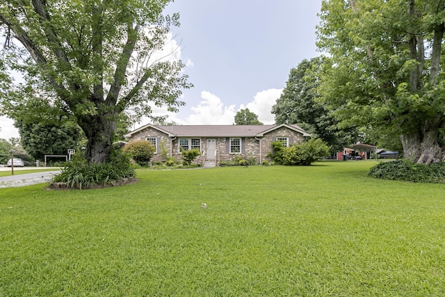 2802 Canterbury Dr, Springfield, TN 37172 - ranch-style home with a front yard and brick siding