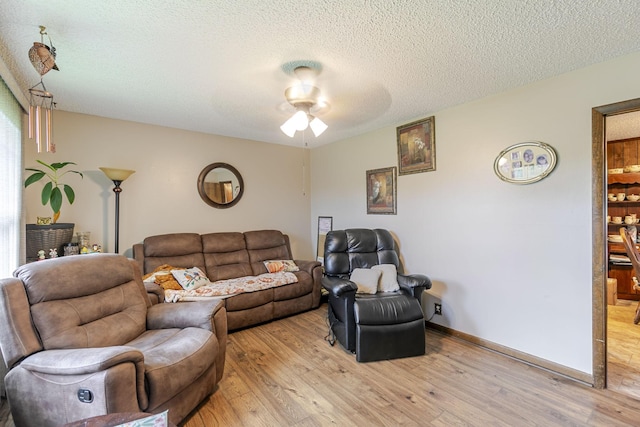 2802 Canterbury Dr, Springfield, TN 37172 - living room with a ceiling fan, light wood-type flooring, and a textured ceiling