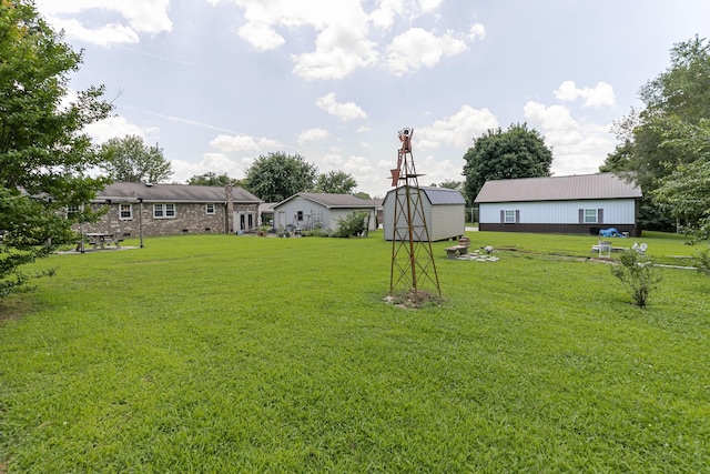 2802 Canterbury Dr, Springfield, TN 37172 - view of grassy yard featuring a shed