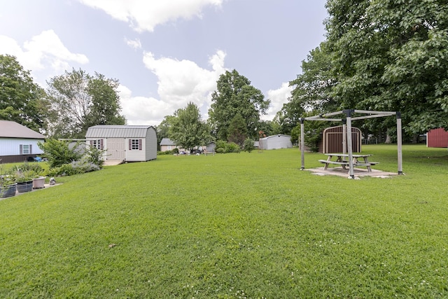 2802 Canterbury Dr, Springfield, TN 37172 - view of grassy yard with a storage shed