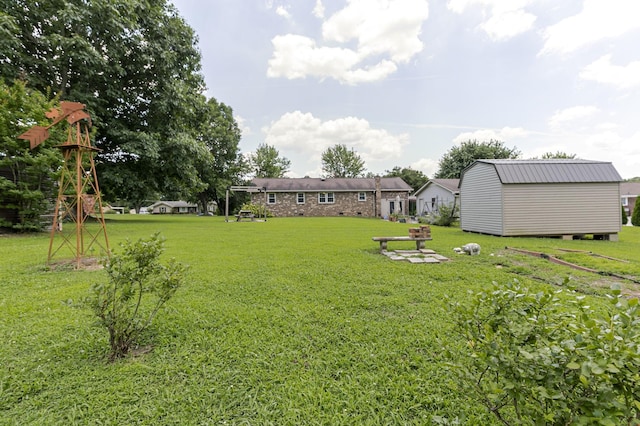 2802 Canterbury Dr, Springfield, TN 37172 - view of green lawn with an outbuilding