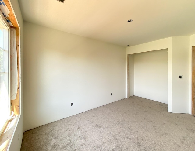 305 Towles Ave Unit A, Mcminnville, TN 37110 - unfurnished bedroom with light carpet and a closet