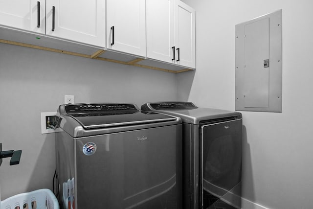 1014 Douglas Ct, Dickson, TN 37055 - laundry area featuring electric panel, cabinet space, and independent washer and dryer