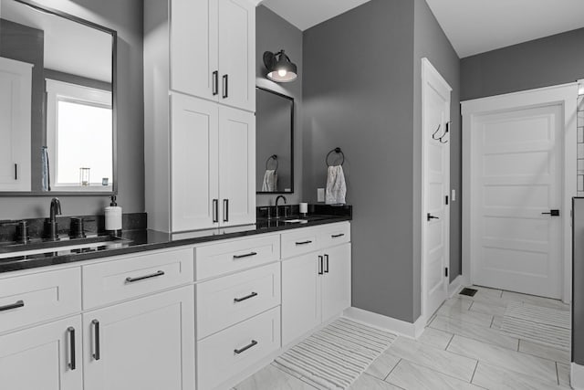 1014 Douglas Ct, Dickson, TN 37055 - full bath with double vanity and marble look tile flooring