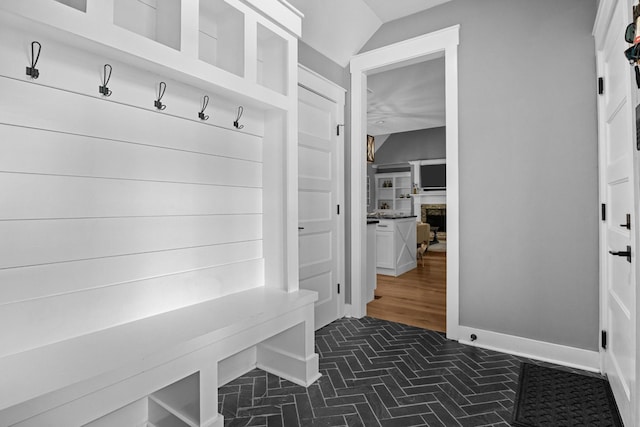 1014 Douglas Ct, Dickson, TN 37055 - mudroom featuring a fireplace and baseboards