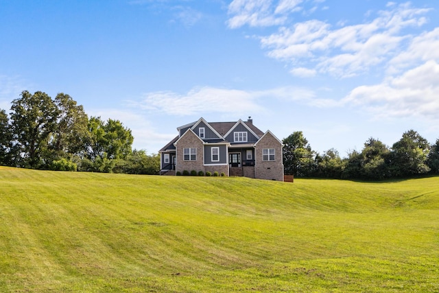 1014 Douglas Ct, Dickson, TN 37055 - craftsman-style house with a front lawn, brick siding, and a chimney