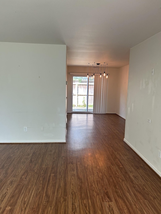 604 Granville Rd Unit 604, Franklin, TN 37064 - spare room with a chandelier and dark wood-style floors