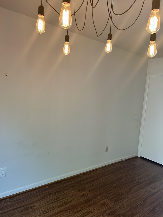 604 Granville Rd Unit 604, Franklin, TN 37064 - unfurnished dining area with dark wood-style flooring and baseboards