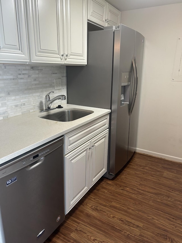 604 Granville Rd Unit 604, Franklin, TN 37064 - kitchen with dishwasher, backsplash, white cabinetry, and dark wood finished floors