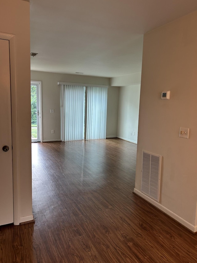 604 Granville Rd Unit 604, Franklin, TN 37064 - spare room featuring dark wood-style flooring and baseboards