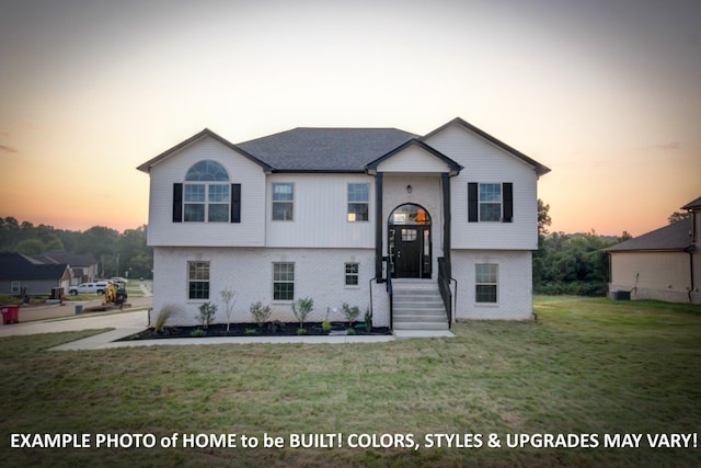 1988 Flats Rd, Cunningham, TN 37052 - raised ranch with brick siding and a front yard