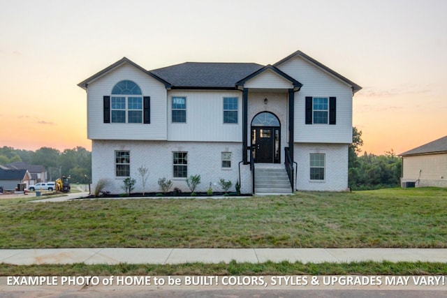 1988 Flats Rd, Cunningham, TN 37052 - raised ranch featuring brick siding and a lawn