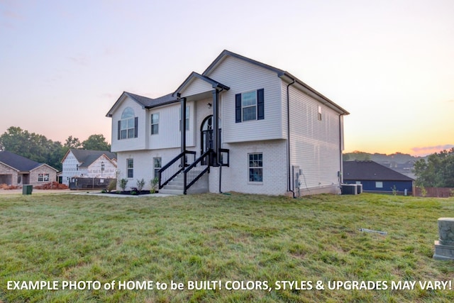 1988 Flats Rd, Cunningham, TN 37052 - split foyer home featuring a lawn and brick siding