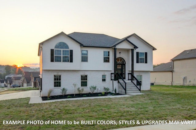 1988 Flats Rd, Cunningham, TN 37052 - bi-level home featuring a yard and brick siding