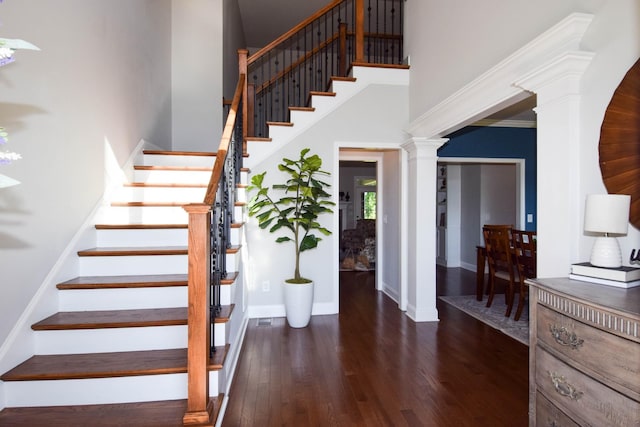 216 Honeysuckle Ln, Lebanon, TN 37087 - stairs with a towering ceiling, decorative columns, and wood finished floors