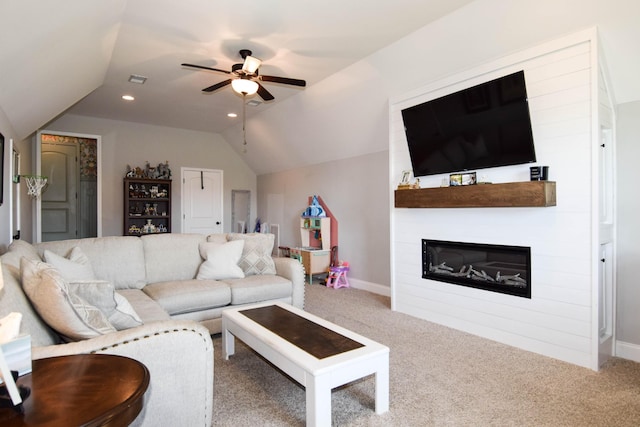 216 Honeysuckle Ln, Lebanon, TN 37087 - carpeted living area featuring vaulted ceiling, a ceiling fan, and a large fireplace