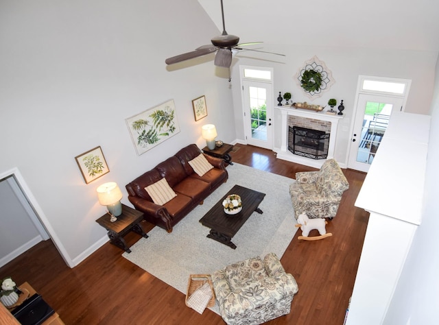 216 Honeysuckle Ln, Lebanon, TN 37087 - living room with healthy amount of natural light, wood finished floors, ceiling fan, and a fireplace