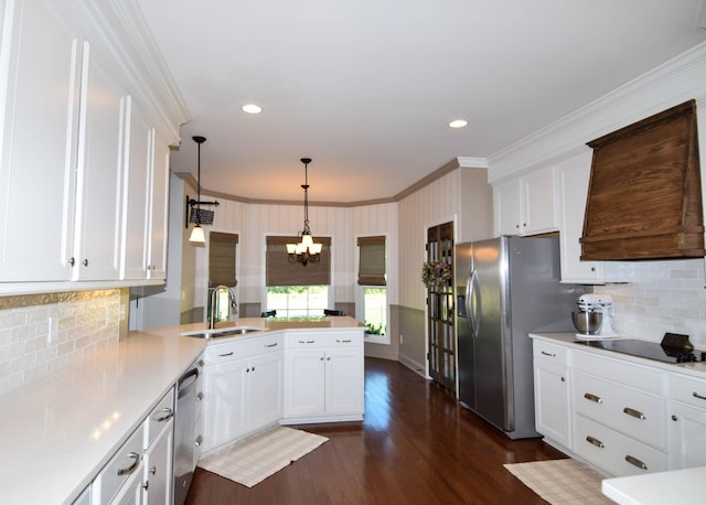 216 Honeysuckle Ln, Lebanon, TN 37087 - kitchen featuring ornamental molding, stainless steel appliances, a peninsula, premium range hood, and white cabinetry