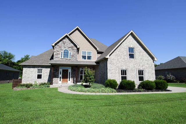 216 Honeysuckle Ln, Lebanon, TN 37087 - craftsman-style home featuring a front lawn and brick siding