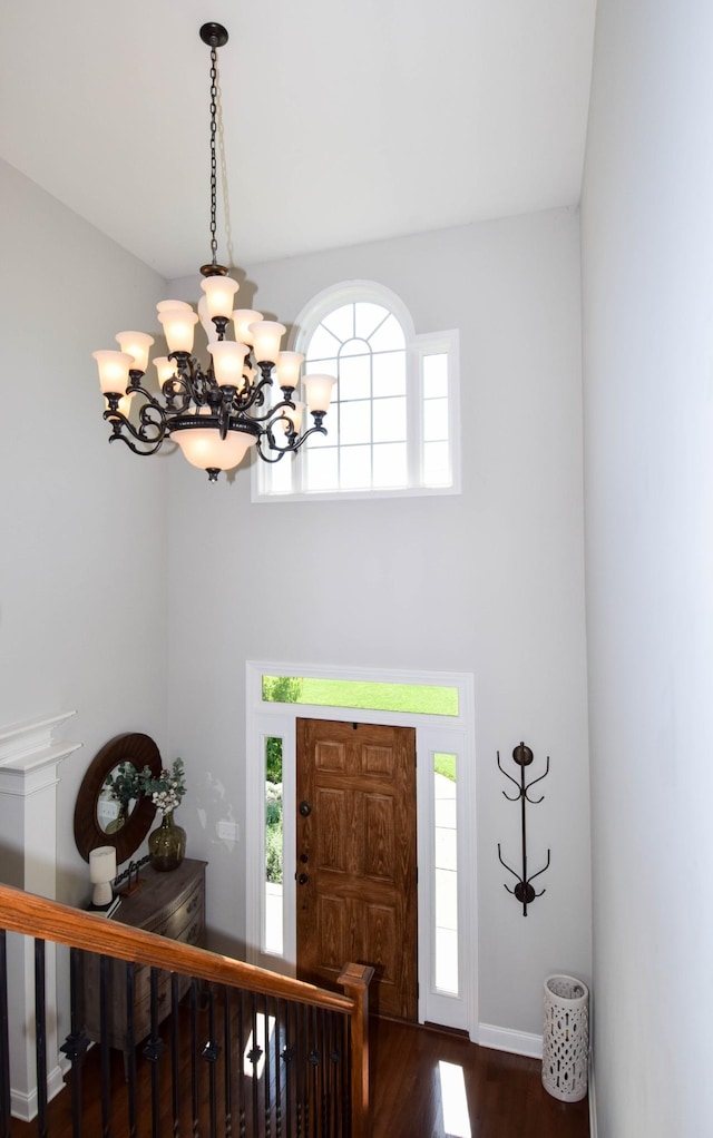 216 Honeysuckle Ln, Lebanon, TN 37087 - foyer with dark wood finished floors, a chandelier, and plenty of natural light