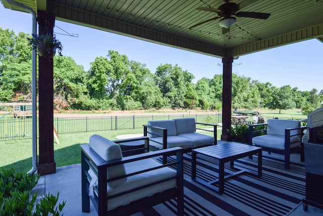 216 Honeysuckle Ln, Lebanon, TN 37087 - fenced backyard featuring an outdoor hangout area, ceiling fan, a patio, and view of wooded area