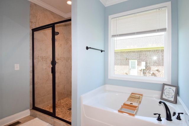 216 Honeysuckle Ln, Lebanon, TN 37087 - bathroom featuring a garden tub, a shower stall, and ornamental molding